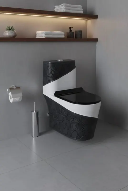 Black and white textured one-piece toilet with black seat at Brazil Plumbing Center