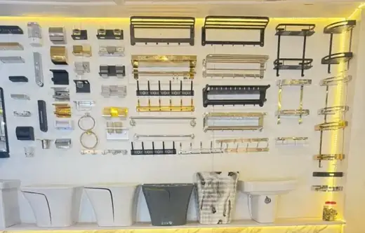 Bathroom accessories wall at Brazil Plumbing Center Fort Portal